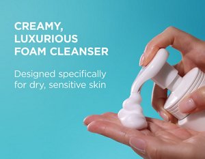 Close-up image of hand holding Curél Foaming Facial Wash and pumping a bouncy, soft foam into hand 