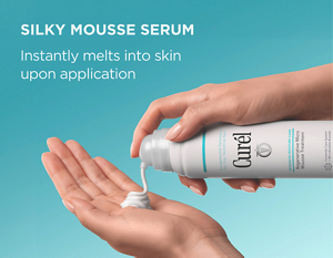 Curél Regenerative Micro Mousse Treatment dispensing silky mousse into an open hand