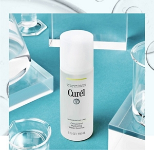 Curél Oil Control Hydrating Water Essence in a scientific setting against a teal background