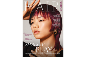 four diverse woman with different hair colors and lenghts, which stand side by side and close to each other looking into the camera while standing in front of a clean grey background