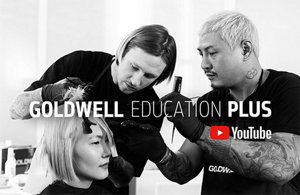 Two male hair colorists dyeing woman's hair