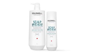 One white goldwell bottle with a dispenser and one white goldwell bottle on a white background
