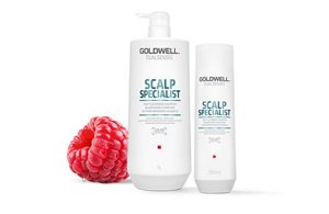 One white goldwell bottle with a dispenser and one white goldwell bottle on a white background with a raspberry