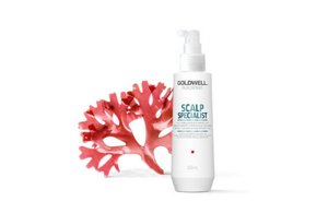 One white golwell bottle with a dispenser on a white background and a red coral.