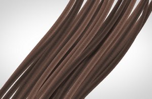 Group of a graphic design hair tinted on medium brown on a light grey background.