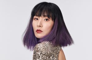 seven goldwell stylesign styling product line in a row on a white background