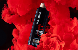 A bottle of Topchic 5BG in a plume of red color