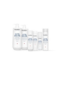 six goldwell products ultra volume for hair lined up horizontally in a row on a white background