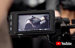 an image of a camera filming content for the goldwell education plus youtube channel