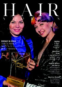 four diverse woman with different hair colors and lenghts, which stand side by side and close to each other looking into the camera while standing in front of a clean grey background