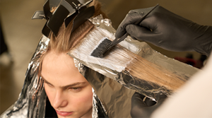 Model posing for Blonde Made Better Product by Goldwell