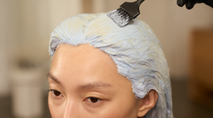 Model posing for Blonde Made Better Product by Goldwell