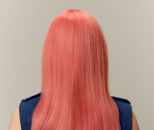 Model posing for Color of The Year Product by Goldwell