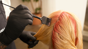 Model posing for Color of The Year Product by Goldwell