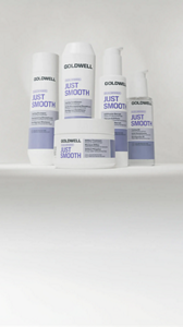 Goldwell Dualsenses Just Smooth product range displayed on a grey background