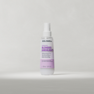 Φιάλη Goldwell Dualsenses Blondes & Highlights Serum Spray 150 ml, τοποθετημένη σε όρθια θέση πάνω σε ένα απαλό ανοιχτό γκρι φόντο στούντιο.