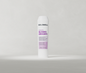 Goldwell Dualsenses Blondes & Highlights Conditioner σε σωληνάριο των 200 ml, τοποθετημένο σε όρθια θέση πάνω σε ένα απαλό ανοιχτό γκρι φόντο στούντιο.