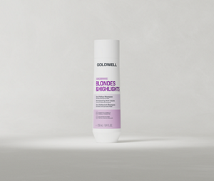 Σαμπουάν Goldwell Dualsenses Blondes & Highlights σε συσκευασία των 250 ml, τοποθετημένο σε όρθια θέση πάνω σε ένα απαλό, ανοιχτό γκρι φόντο στούντιο.
