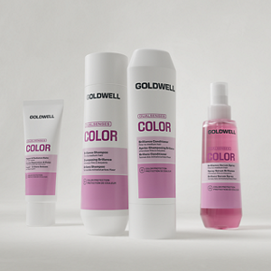 Goldwell Dualsenses Color products shown as shampoo, conditioner, treatment and serum packaging arranged together on a light grey studio background.