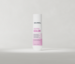 Goldwell Dualsenses Color Shampoo 250 ml bottle standing upright on a light grey studio background.