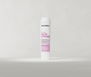 Goldwell Dualsenses Color Extra Rich Conditioner 300 ml tube standing upright on a soft light grey studio background.