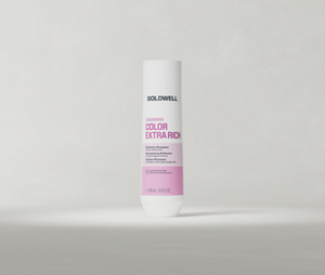 Goldwell Dualsenses Color Extra Rich Shampoo 250 ml bottle standing upright on a soft light grey studio background.