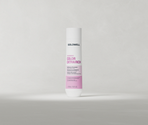 Goldwell Dualsenses Color Extra Rich Shampoo 300 ml bottle standing upright on a soft light grey studio background.