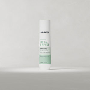 Goldwell Dualsenses Curls & Waves Bundling Shampoo 300 ml bottle standing upright on a soft light grey studio background.