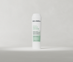Goldwell Dualsenses Curls & Waves Bundling Conditioner 200 ml tube standing upright on a soft light grey studio background.