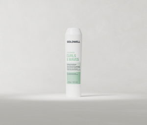 Goldwell Dualsenses Curls & Waves Bundling Conditioner 300 ml tube standing upright on a soft light grey studio background.