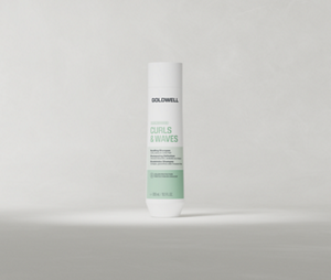 Goldwell Dualsenses Curls & Waves Bundling Shampoo 300 ml bottle standing upright on a soft light grey studio background.