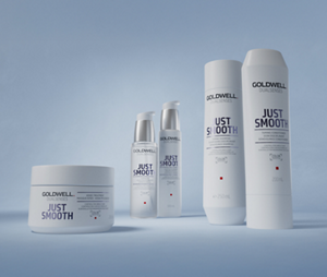 Group shot of Goldwell's Dualsenses Just Smooth range with Kukui Nut Oil to control and manage unruly and frizzy hair. Including Taming Shampoo, Taming Conditioner, Taming Oil, 6 Effects Serum and 60 Sec Treatment
