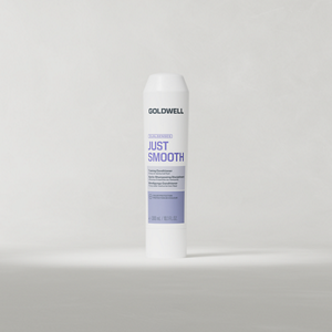 Goldwell Dualsenses Just Smooth Conditioner 200 ml tube standing upright on a soft light grey studio background.