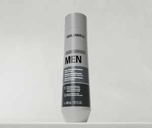 Een close-up van een fles Goldwell Dualsenses Men Hair & Body Shampoo tegen een lichtgrijze studioachtergrond.