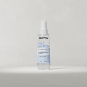 Goldwell Dualsenses Pure Hydration Serum Spray 150 ml bottle standing upright on a soft light grey studio background.
