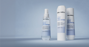 Goldwell Dualsenses Pure Hydration range displayed as three white and blue haircare products on a soft blue gradient background.