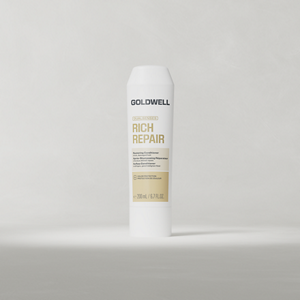 Goldwell Dualsenses Rich Repair Conditioner 200 ml tube standing upright on a soft light grey studio background.