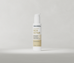 Goldwell Dualsenses Rich Repair 6 Effects Serum bottle standing upright on a soft light grey studio background.