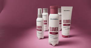 Goldwell Elumen rangeshot arranged on a pink studio background.