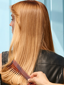 Models posing with blonde hair and combed hair
