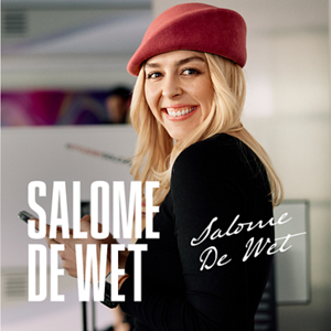 Global Color Collective Member, Salome De Wet, stands in a pink beret as she smiles towards the camera.