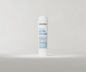 Goldwell Dualsenses Ultra Volume Conditioner 200 ml tube standing upright on a soft light grey studio background.