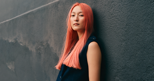 Model posing for Color of The Year News Product by Goldwell