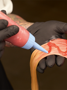 Model posing for Color of The Year News Product by Goldwell