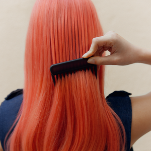 Model posing for Color of The Year News Product by Goldwell