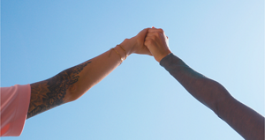 Hands holding together 