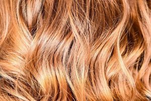 Close-up of gold and honey balayage