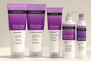 John Frieda's Infinite Smooth haircare products against a neutral background