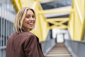 Woman with balayaged hair cut into a bob