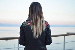 Woman with professional-looking straight blow-dried hair